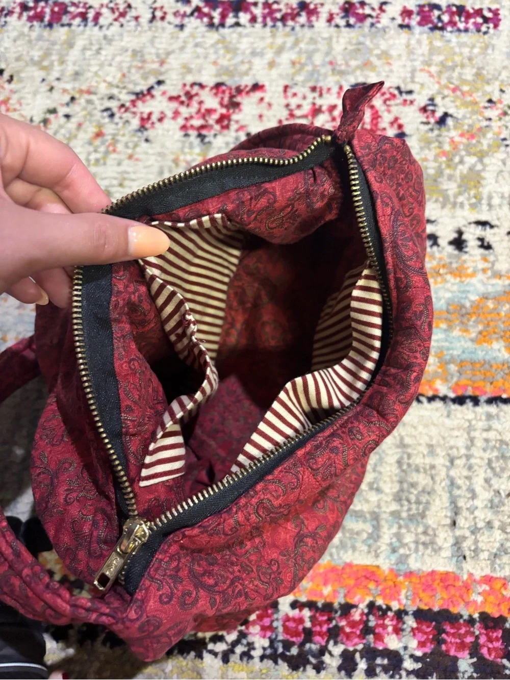 Quilted Red Pattern Shoulder Bag with Decorative Medallion